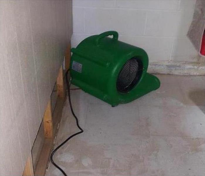 removed 1-foot of wall, studs showing, green air mover