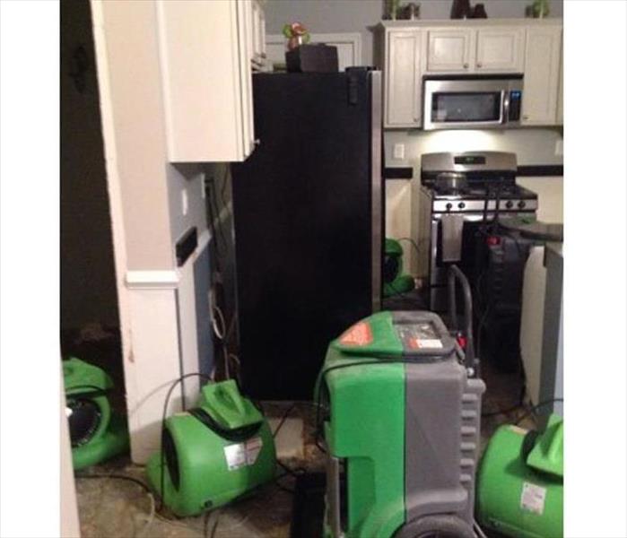 equipment in kitchen, range dehu, and air movers